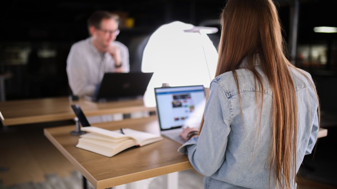 Journalist writing news article at desk