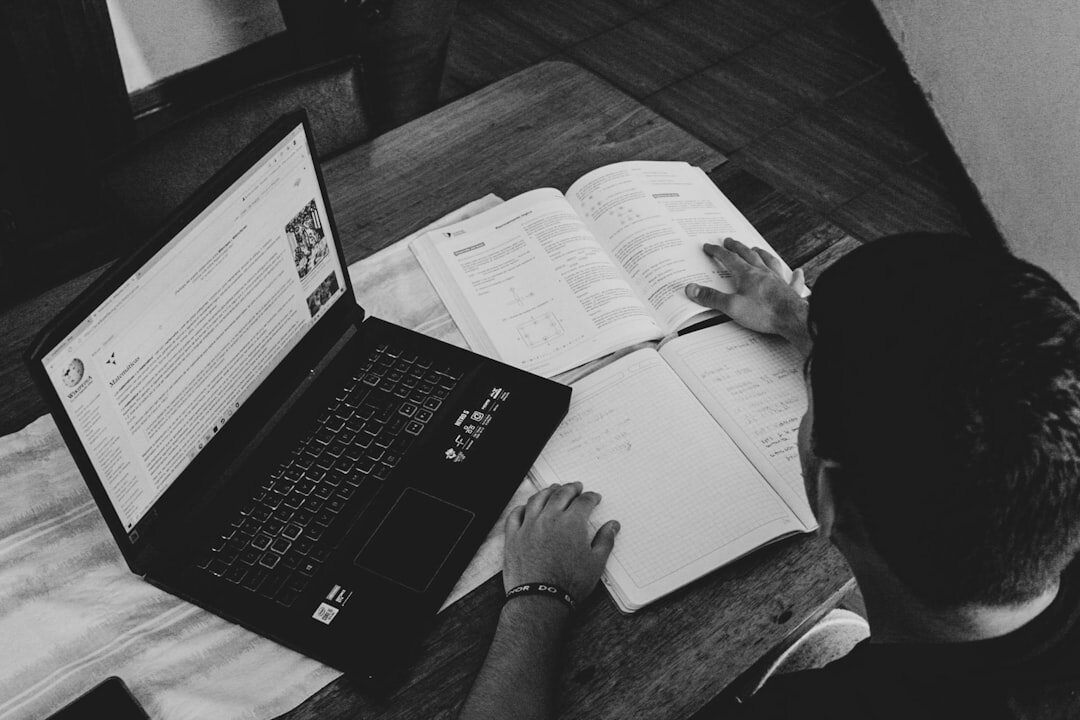 Online learning setup with laptop and notebook